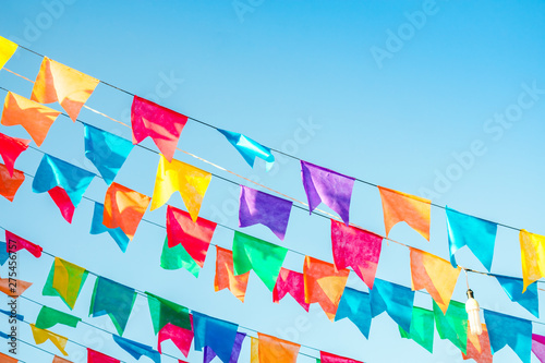 Typical colorful flags used for decoration at the June Festivals (aka festas de Sao Joao), with copy space (Oeiras, Brazil)