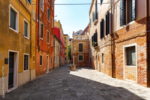 Fototapeta Naklejka Na Ścianę i Meble -  Venice in Italy. Beautiful cozy street. Summer cityscape