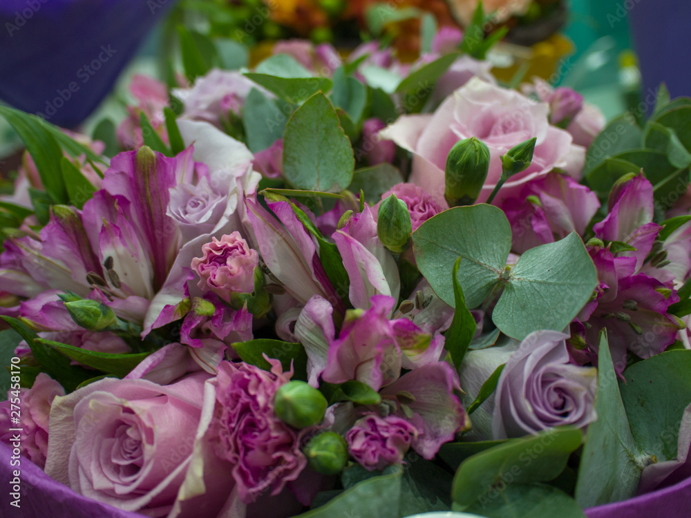 Bunch of purple roses  and astromerias