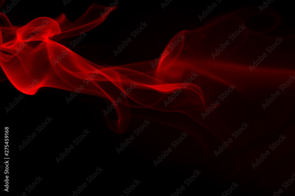 Obraz premium Fire of red smoke abstract on black background, darkness concept