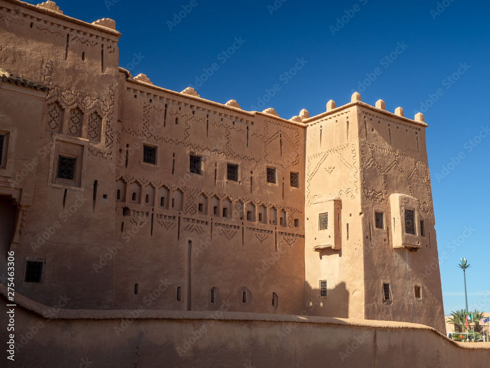 Taourirt Kasbah, Ouarzazate, Morocco, North Africa [Moroccan mountain landscape, old ancient Taourirt Kasbah castle fortress, street and buildings with kids and market]
