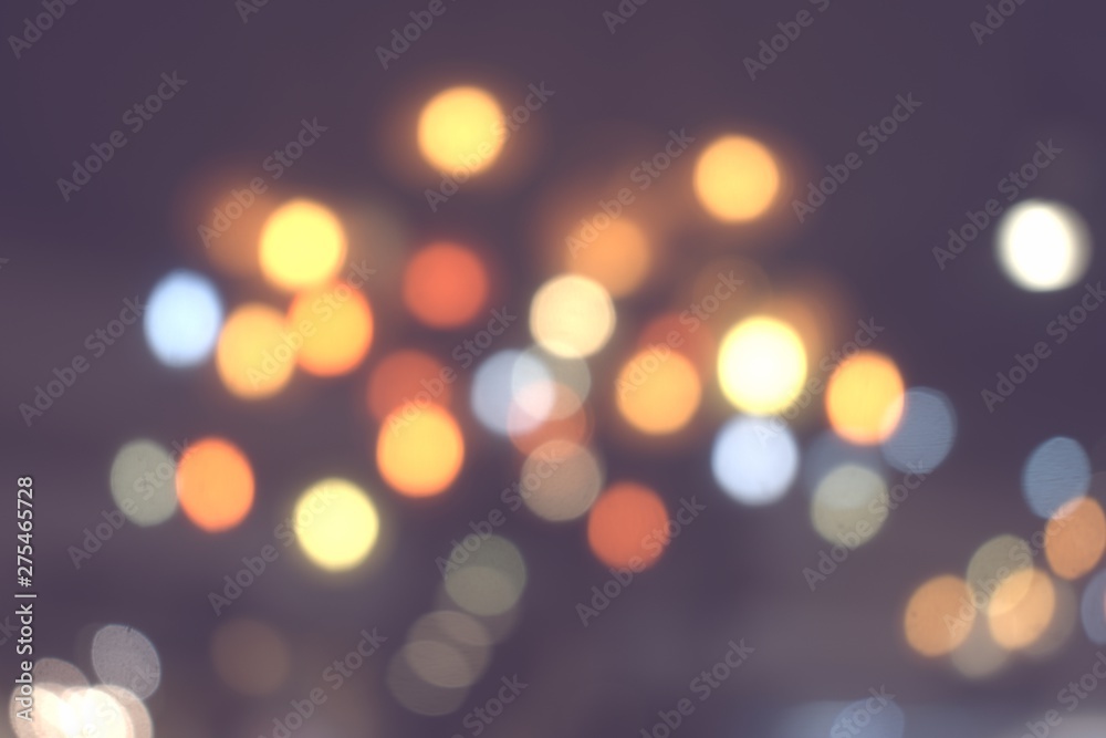 Fototapeta premium niewyraźne kolory bokeh orrange światło w porze nocnej, rozmyte tło