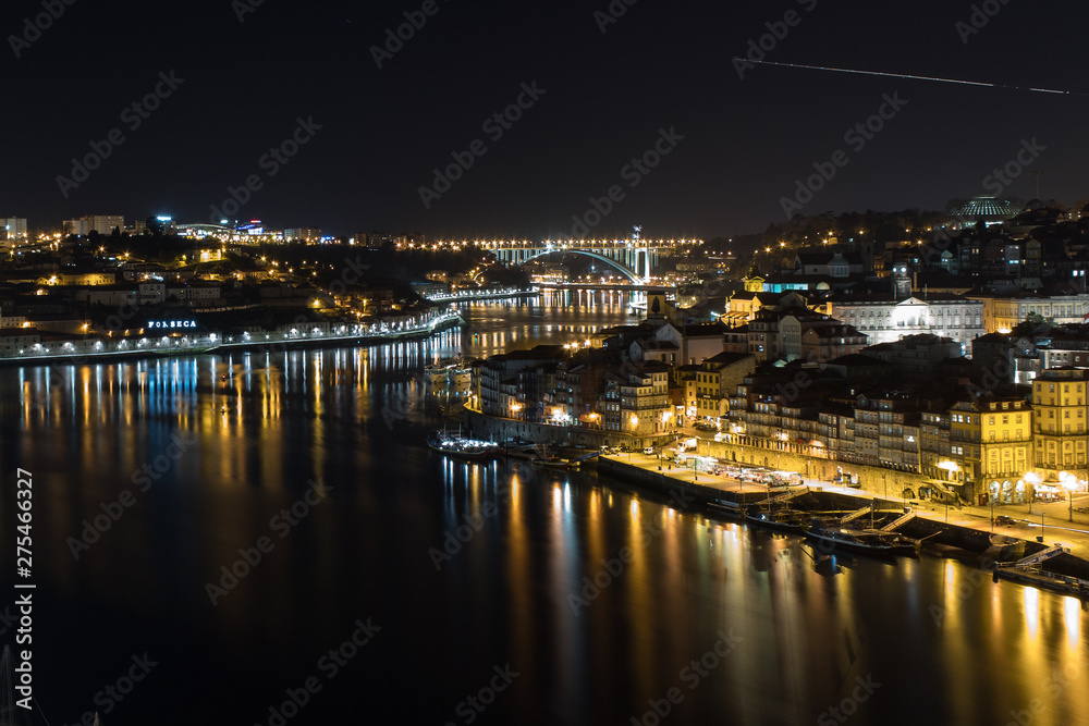 Panoramic view of the city of Porto and Vila Nova de Gaia at night with the river Douro between the two cities, Porto, northern Portugal