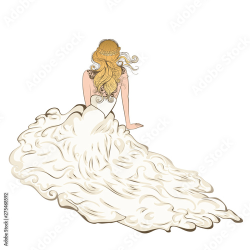 Bride sit in fluffy dress