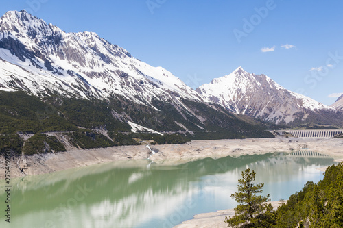 Alpine landscape with artificial lake, italy