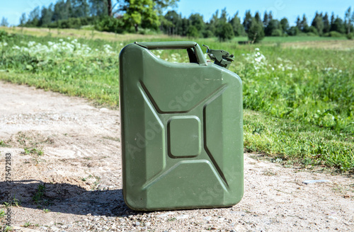 Canister of gasoline. Green Metal military style