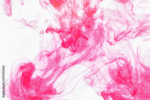 pink paint diluted in water on a white background