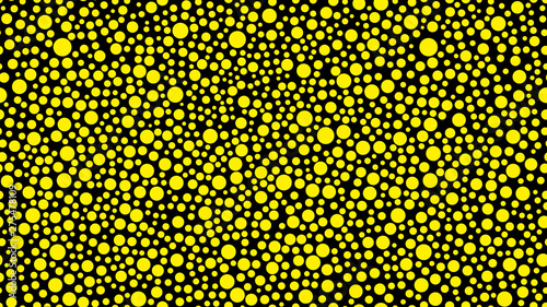 Contemporary screensaver with elements of geometry. Widescreen background with randomly scattered yellow circles for a bold and catchy solution in style or new trend. Seamless option.
