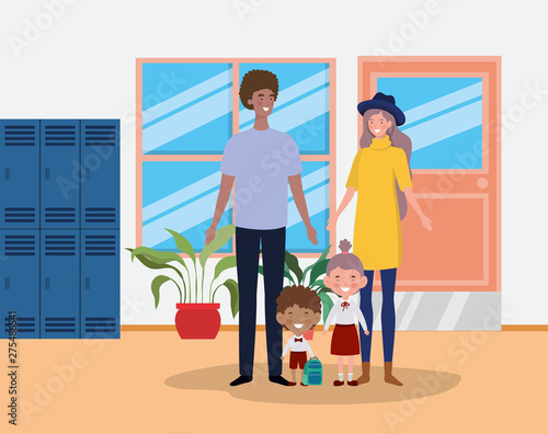 teacher couple with little students kids in the school corridor