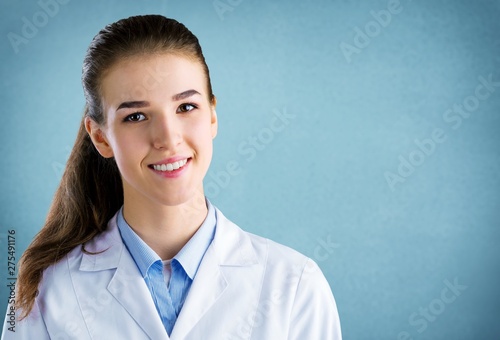 Young man doctor holding stethoscope