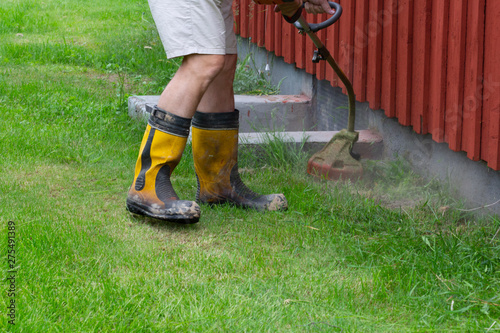 man mowing lawn