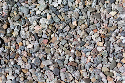 Surface of colorful pebble as background 