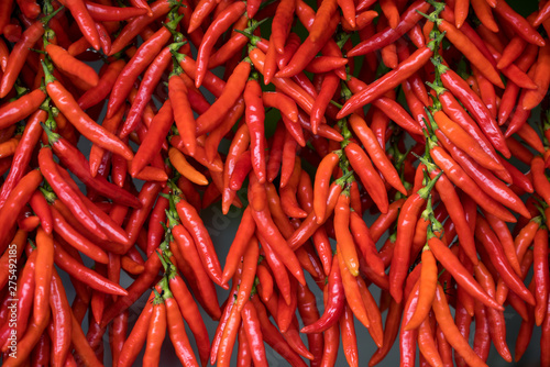 Red Chilies drying abstract background 