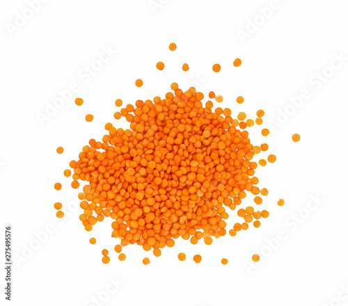 Heap of orange lentil lens isolated on white