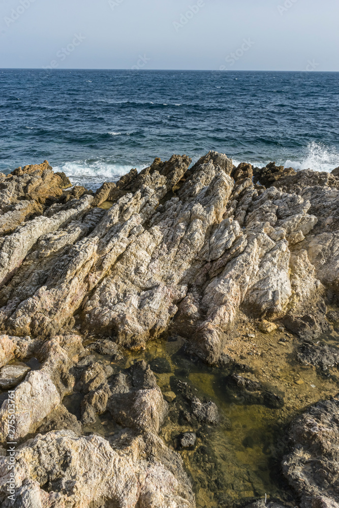 Mediterranean sea crashing against the rocks of the Spanish island of Mallorca, Ibiza, Spain.