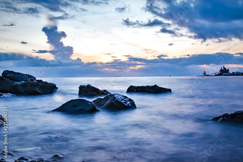 rocks at sea water ocean sunset  © Mercado's Photo