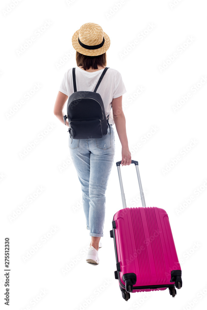 back view of female tourist walking with suitcase isolated on white back view of female tourist walking with suitcase isolated on white