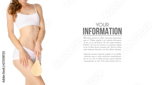 Beautiful woman brush from cellulite in hands, sample text on a white background. Isolation