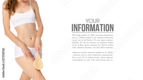 Beautiful woman brush from cellulite in hands, sample text on a white background. Isolation
