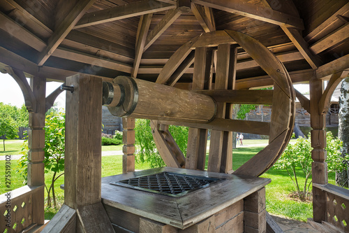 Old wooden well, historic background