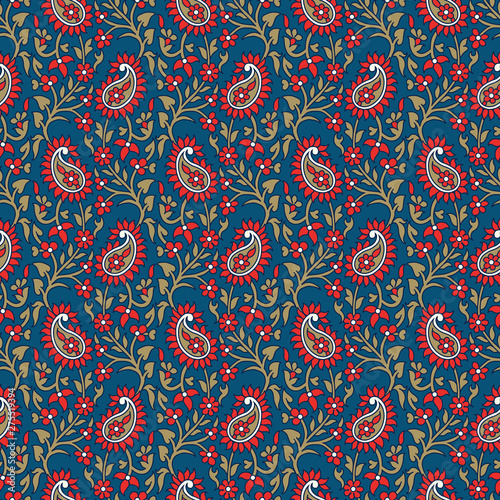 Woodblock printed indigo dye seamless ethnic floral pattern. Traditional oriental ornament of India, all over paisley motif, red and golden on blue background. Textile design.