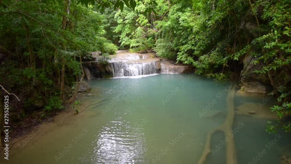 Beautiful waterfall and emerald pool in tropical rain forest in Thailand. Beautiful waterfall and emerald pool in tropical rain forest in Thailand.