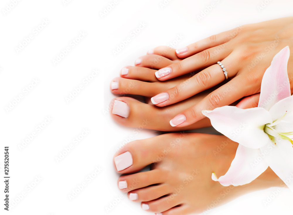 manicure pedicure with flower lily close up isolated on white perfect shape hands spa salon