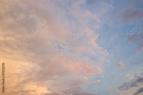 the sky with gentle clouds of pink shade, colored by the setting sun.