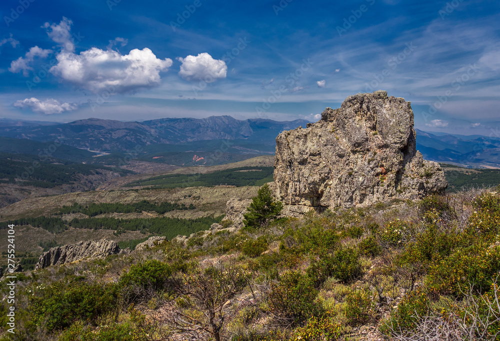 Landscape with rocks and blue sky. Hiker route in the 