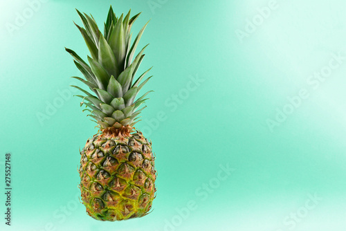 Pineapple on a green background