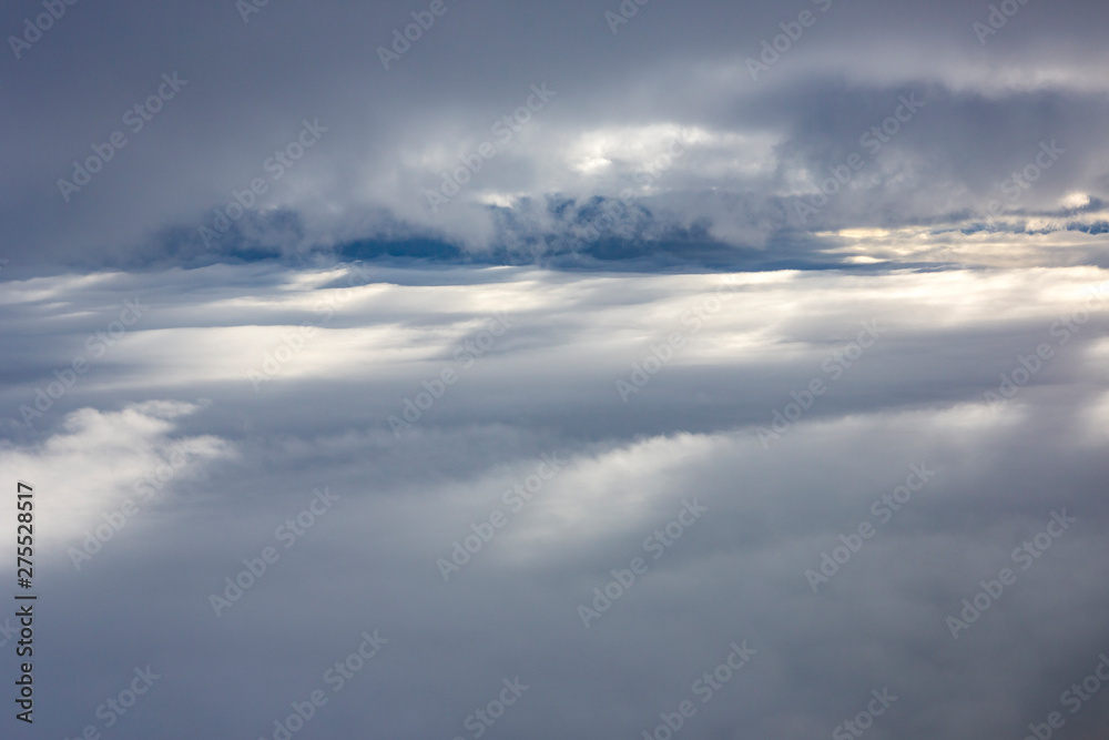Clouds shortly before landing at svalbard, Artic, Norway Clouds shortly before landing at svalbard, Artic, Norway