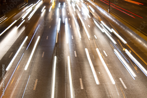 Night road with car light trails