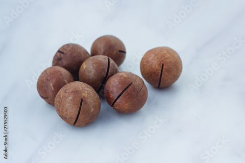 Ripe macadamia nuts close-up. healthy food, vitamins