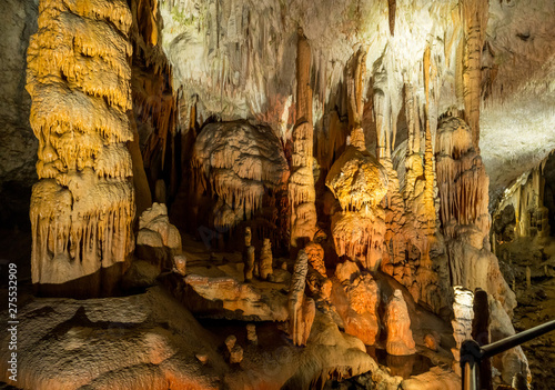 Stalactites and stalagmites underground in cave system in Postojna