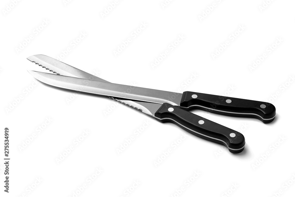 Modern sharp slicing and bread knives isolated on white Modern sharp slicing and bread knives isolated on white