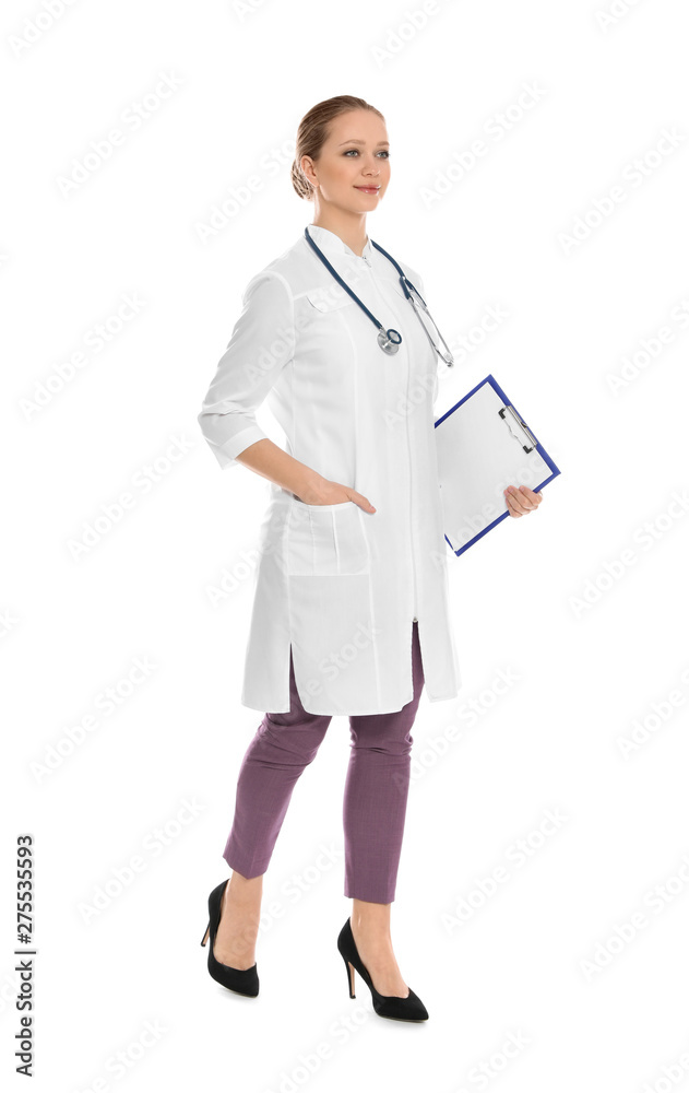 Full length portrait of medical doctor with clipboard and stethoscope isolated on white Full length portrait of medical doctor with clipboard and stethoscope isolated on white