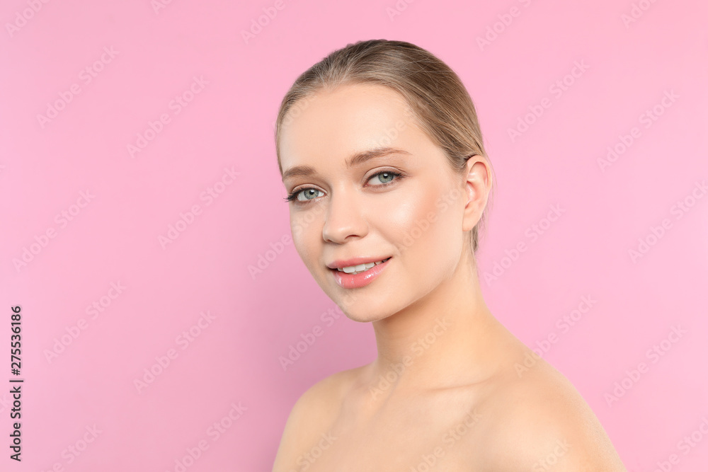 Portrait of young woman with beautiful face on pink background Portrait of young woman with beautiful face on pink background