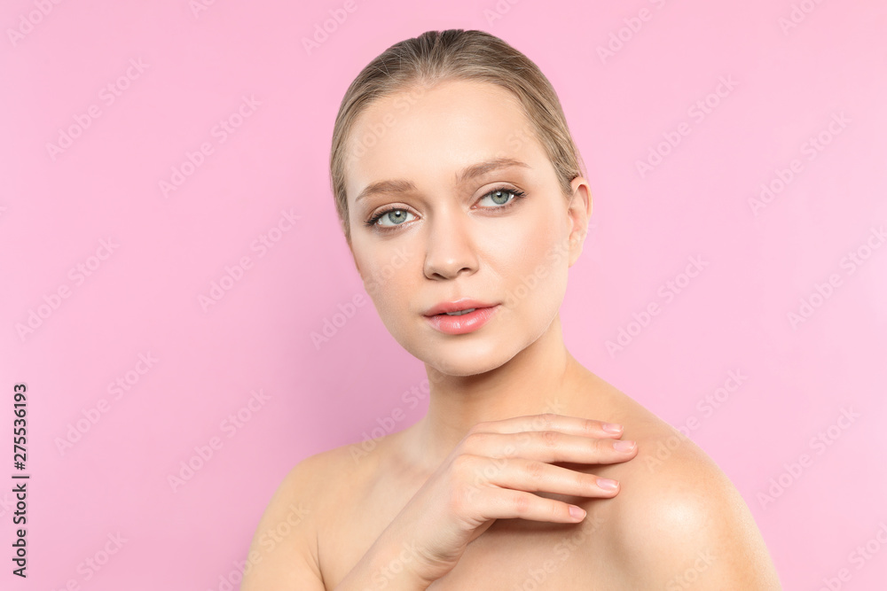 Portrait of young woman with beautiful face on pink background Portrait of young woman with beautiful face on pink background