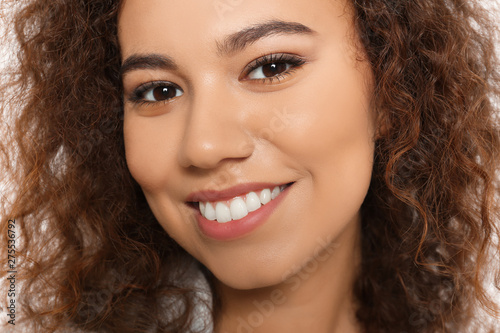 Portrait of young African-American woman with beautiful face, closeup