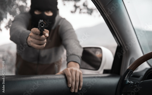 man with a gun threatened driver