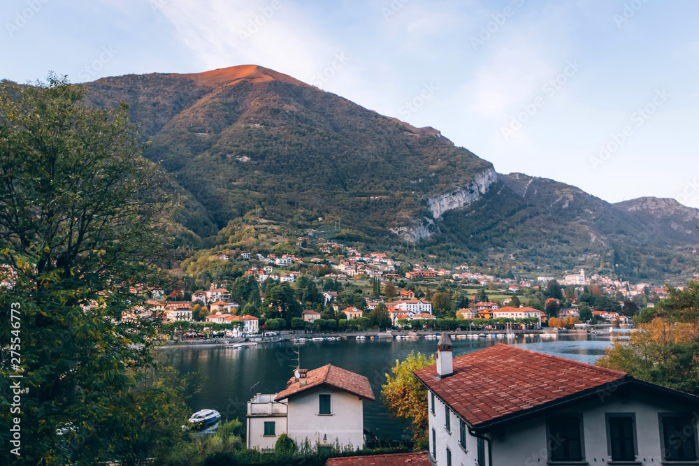 Beautiful view of Lake Como on sunset, Lombardy, Italy. View of beautiful italian Villa on Como lake in sunlight. Picturesque sunset at Lake Como
