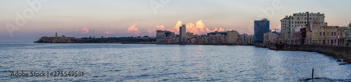 Panoramic view of the Old Havana City, Capital of Cuba, during a colorful cloudy sunset. © edb3_16