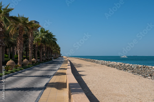 DUBAI, UAE - The Boardwalk on the Palm Jumeirah Island on the Crescent. The Palm Jumeirah is an artificial archipelago created using reclaimed land © Сергій Вовк