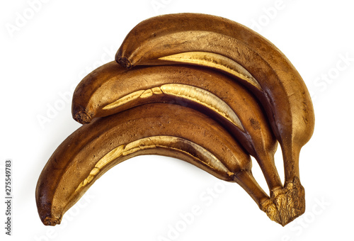 Spoiled banana from the fridge, rotten fruits. Isolated on white background. Darkened banan. Drops of condensation on the peel.