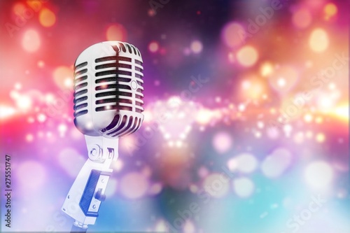 Retro style microphone on background