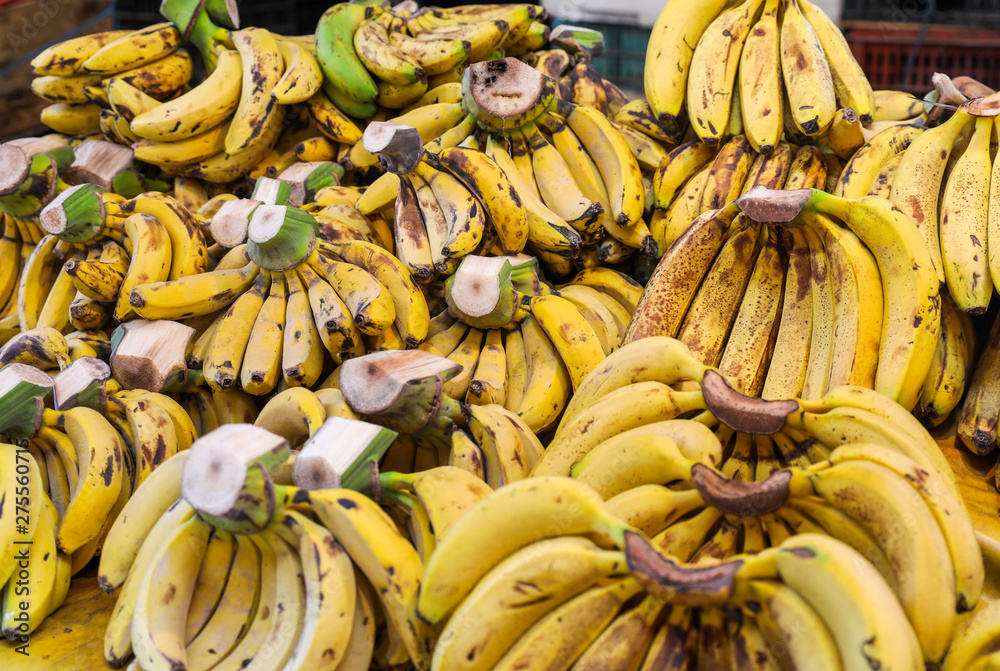 A pile of bananas in a market. 