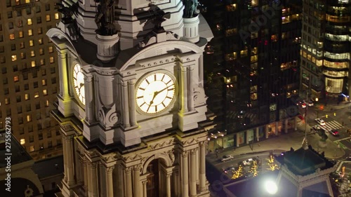 Philadelphia Pennsylvania Aerial v107 Panning birdseye detail of City Hall clock tower low with street view at night - October 2017
