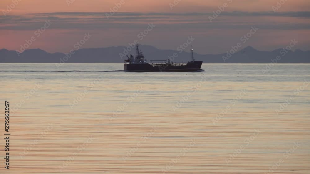 Ship sailing in calm ocean fjord early morning light Iceland.mov Ship sailing in calm ocean fjord early morning light Iceland.mov