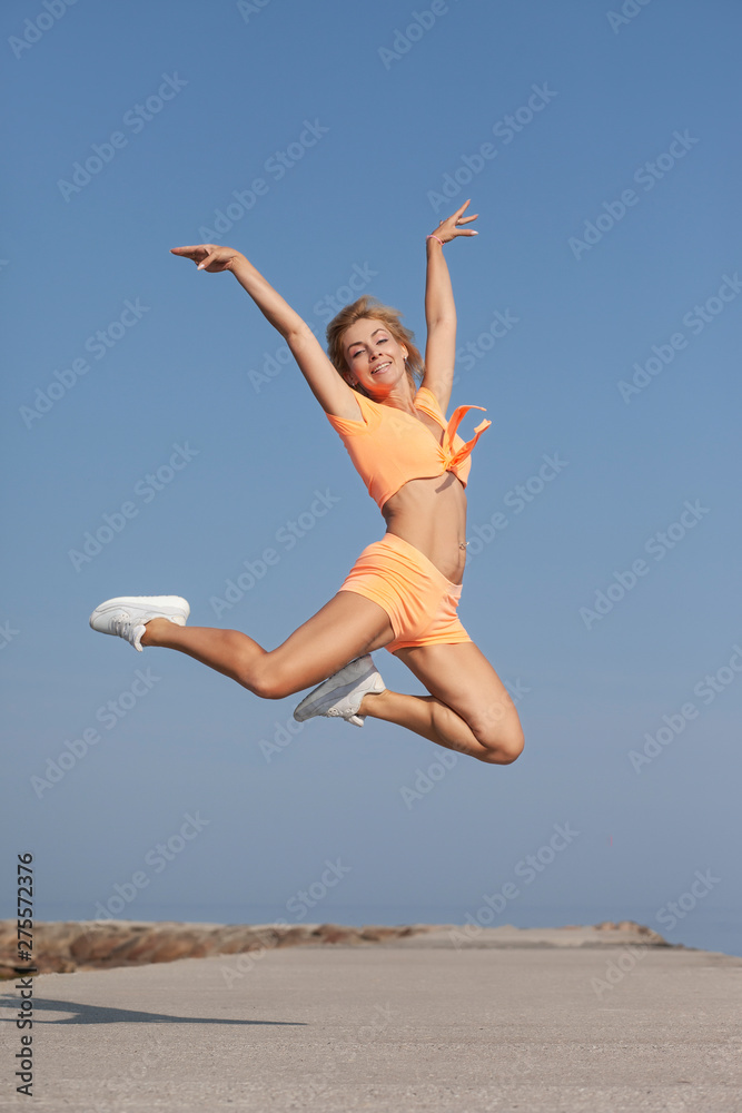 young slim athletic girl in jump young slim athletic girl in jump