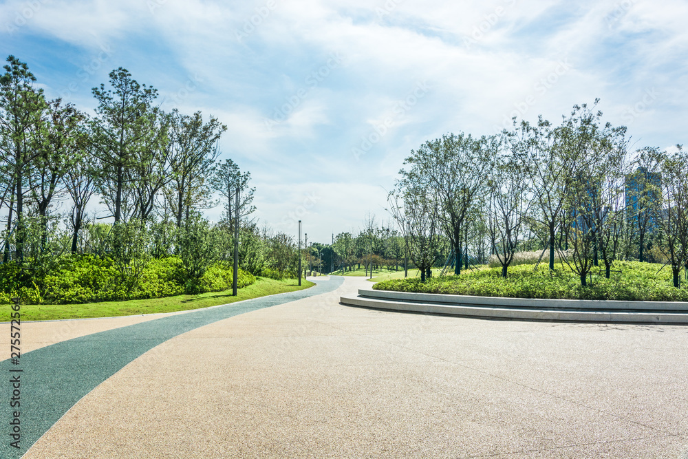 empty square floor and green mountain nature landscape in city park - obrazy, fototapety, plakaty 